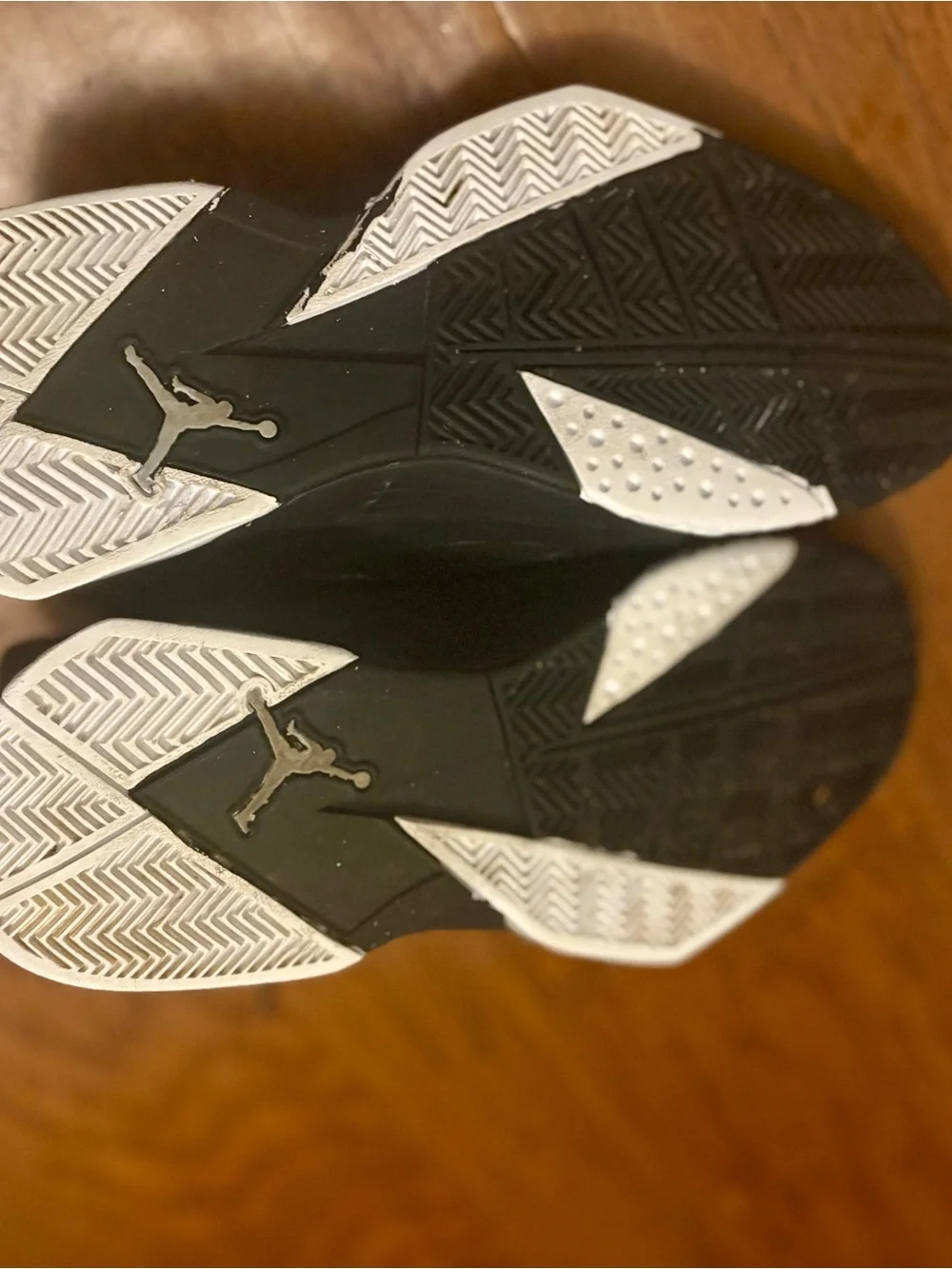 Jordan Black Basketball Sneakers with Gold Tongue Accents